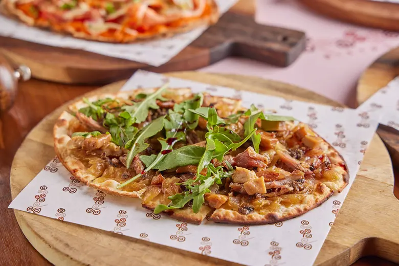 FLAME UP YOUR MEAL IN FRENCH STYLE AT SPASSO BISTRO, WITH AN ENTICING VARIETY OF AUTHENTIC TARTE FLAMBEE