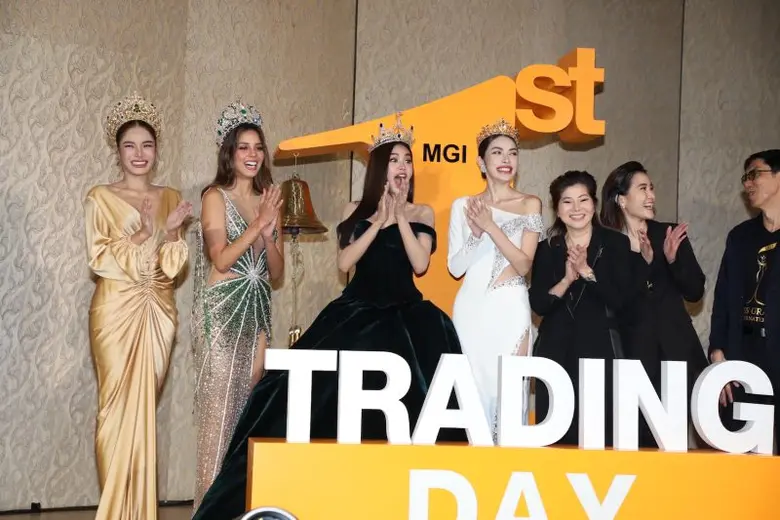 MGI First Trade สุดปัง! เงินสะพัดกว่า 1,300 ล้านบาท "ณวัฒน์" ประกาศ "มิสแกรนด์" จะไม่มีวันขาดทุน "อิงฟ้า - ชาล็อต" ขึ้นแท่นนางงามผู้ถือหุ้นมากที่สุด