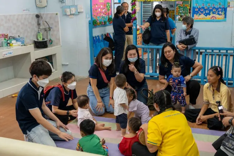 Unithai Group and CUEL organized a community development activity, providing essential items, hosting lunch to children