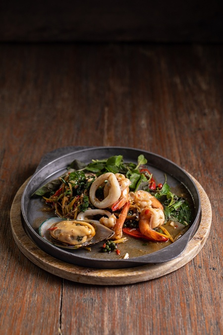 Special dish for the Months of March-May Spicy Seafood Served Sizzling in Its Pan at Cafe Kantary